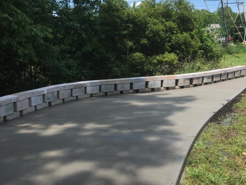 Wide walk with block wall